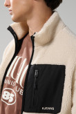 Chaqueta sherpa unicolor con bolsillos y cuello alto