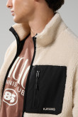 Chaqueta sherpa unicolor con bolsillos y cuello alto