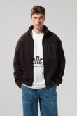 Chaqueta sherpa unicolor con bolsillos y cuello alto