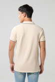 Camiseta unicolor polo con manga corta y doble botón