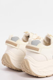 Tenis chunky crema con detalles en contraste kaki.