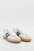 Tenis casuales cremas con contrastes verdes y cortes