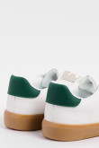 Tenis casuales cremas con contrastes verdes y cortes