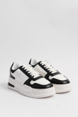 Tenis de plataforma negros con cortes blancos