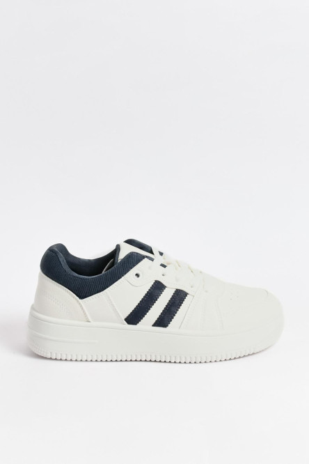 Tenis unicolores casuales con contrastes laterales