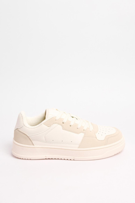 Tenis urbanos en color azul y kaki claro de  suela plana.