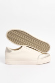 Tenis urbanos en color crema con contrastes en animal print.