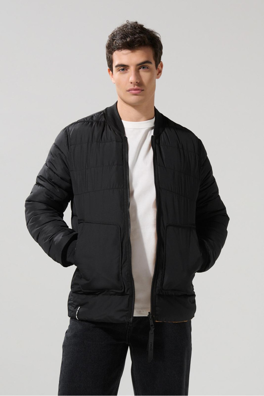 Chaqueta doble faz acolchada  con bolsillos  de parche