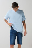 Camiseta oversize unicolor cuello redondo con corte posterior