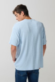 Camiseta oversize unicolor cuello redondo con corte posterior