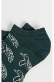 Medias tobilleras verdes oscuras con diseños de tortugas