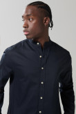 Camisa en algodón unicolor con botones y cuello nerú