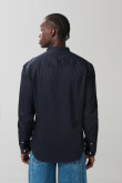 Camisa en algodón unicolor con botones y cuello nerú
