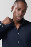 Camisa cuello nerú unicolor en algodón con manga larga