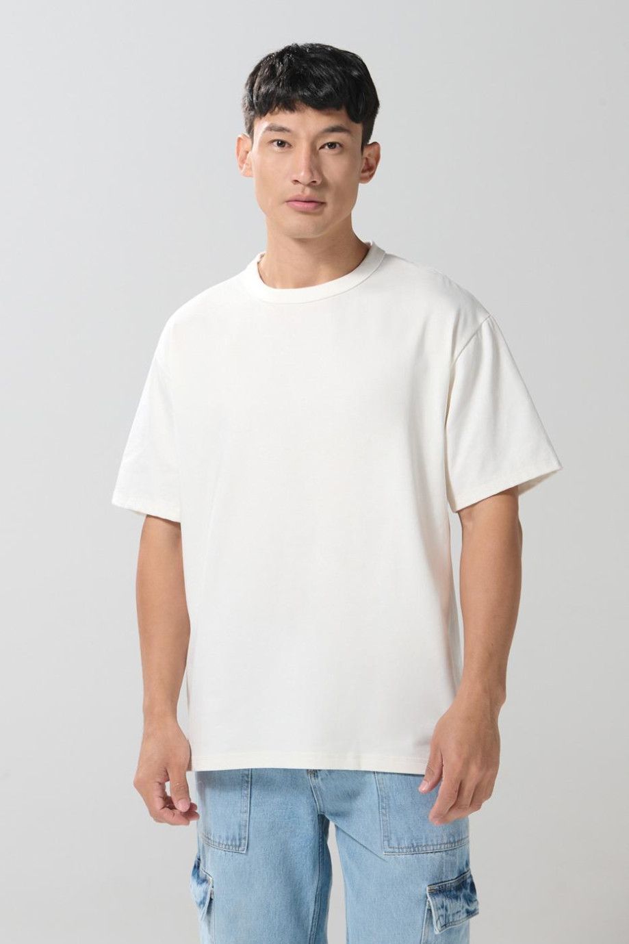 Camiseta unicolor cuello redondo oversize con hombro caído