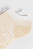 Medias tobilleras en color blanco con diseño de zebra.