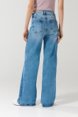 Jean tiro alto azul claro palazzo con bota ancha