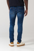 Jean skinny tiro bajo azul con desgastes y rotos