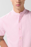 Camisa cuello nerú unicolor con botones en frente