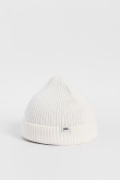 Gorro unicolor tejido con texto en marquilla