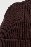 Gorro unicolor tejido con texto en marquilla