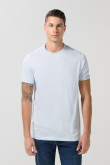 Camiseta unicolor ajustada con cuello redondo y puños en rib