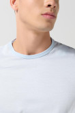 Camiseta unicolor ajustada con cuello redondo y puños en rib