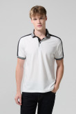Camiseta polo unicolor con franjas en contraste