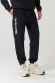 Pantalón azul intenso tipo jogger con diseño de Snoopy