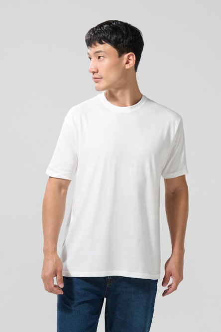 Camiseta manga corta en algodón unicolor con hombro rodado