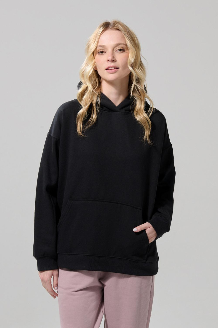 Buzo oversize en tela perchada unicolor con capota