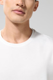 Camiseta unicolor cuello redondo ajustada en algodón