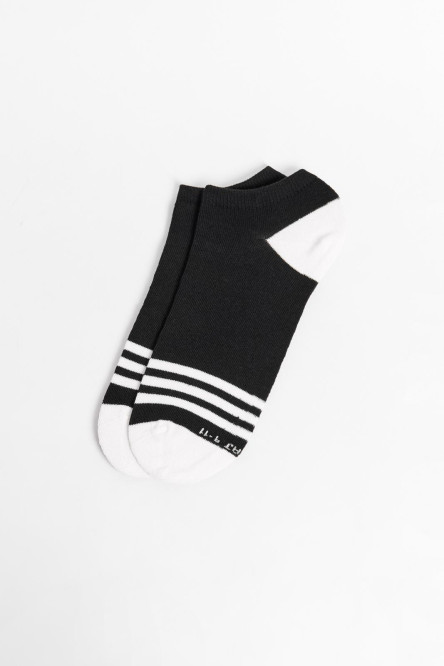 Medias unicolores tipo tobilleras con rayas localizadas