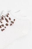 Medias unicolores tobilleras con arte de animal print