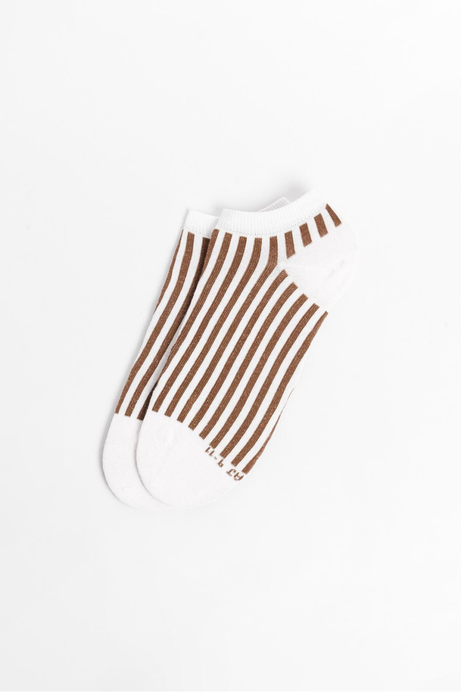 Medias unicolores tipo tobilleras con contrastes y rayas