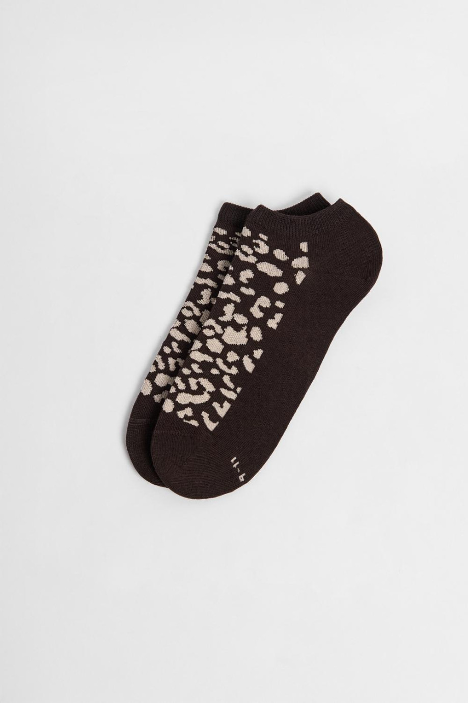 Medias unicolores tobilleras con arte de animal print