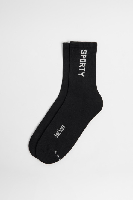 Medias largas unicolores con texturas y texto lateral