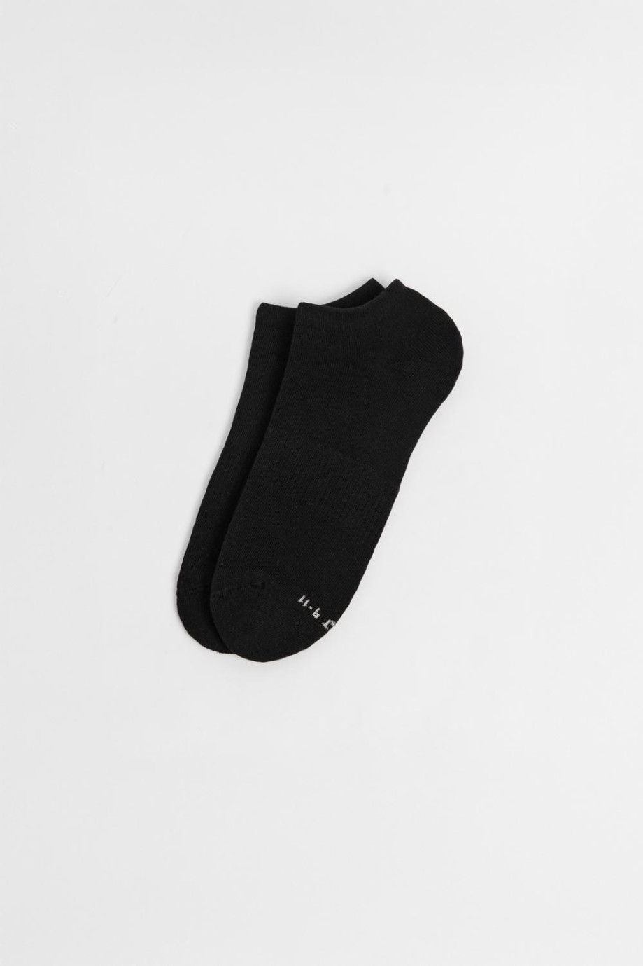 Medias tipo tobilleras unicolores con ajuste localizado