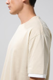 Camiseta oversize cuello redondo unicolor con contrastes