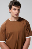 Camiseta oversize cuello redondo unicolor con contrastes
