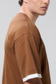 Camiseta oversize cuello redondo unicolor con contrastes