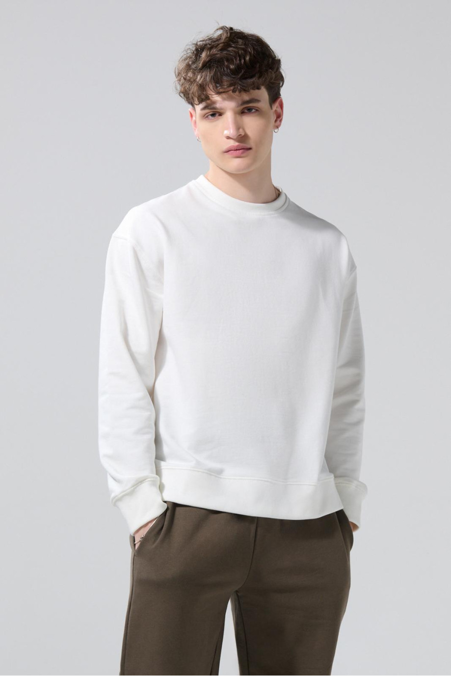 Buzo perchado unicolor oversize con cuello redondo