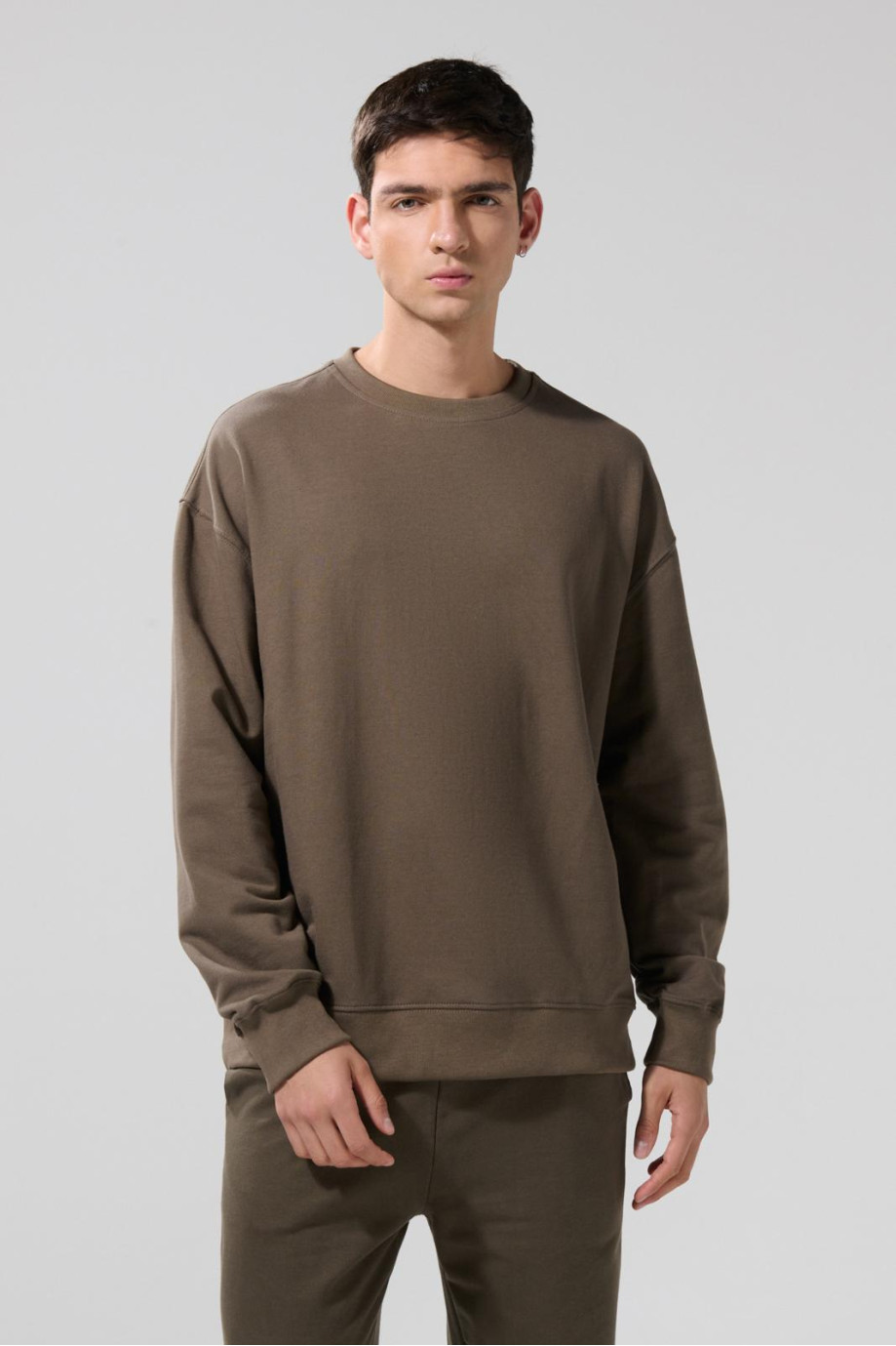 Buzo perchado unicolor oversize con cuello redondo
