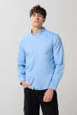 Camisa cuello button down unicolor en algodón manga larga
