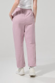 Pantalón unicolor jogger con 2 bolsillos y elásticos