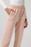 Pantalón unicolor jogger con bolsillos laterales y elástico