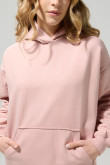 Buzo oversize perchado rosado con capota y bolsillo