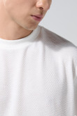 Camiseta oversize unicolor con texturas y cuello redondo