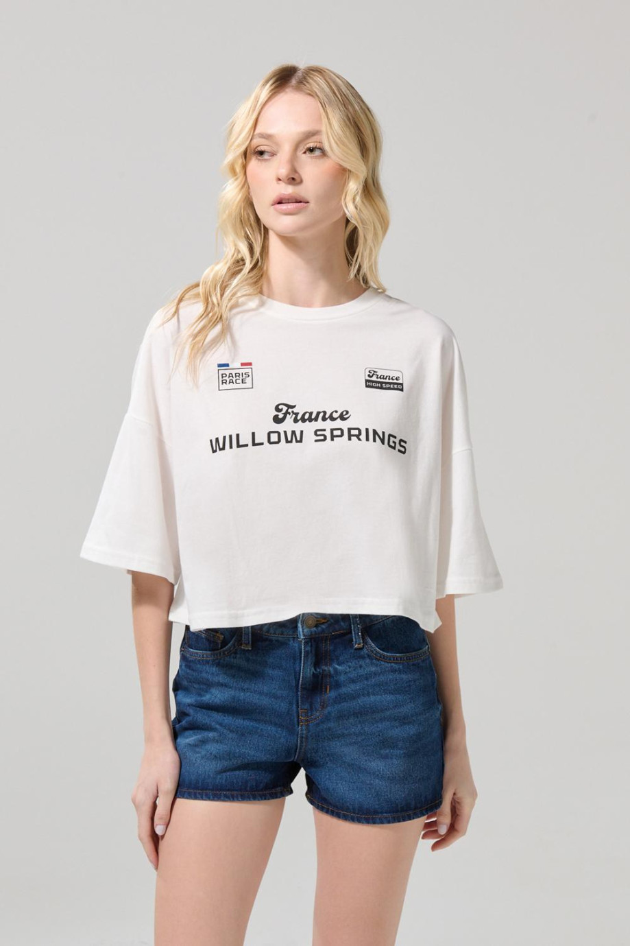 Short en jean azul oscuro con bolsillos y tiro alto