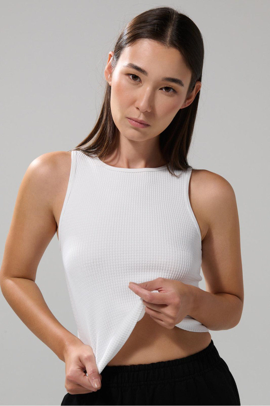 Camiseta crop top acanalada unicolor con manga sisa